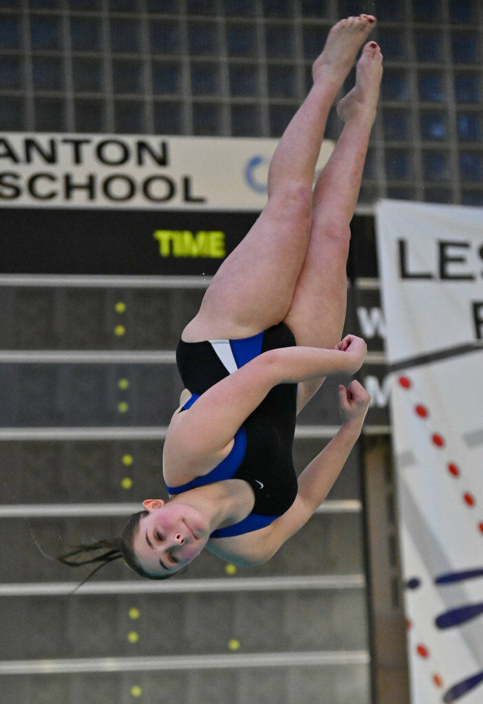 Girl athlete diving.