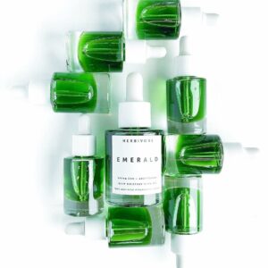 Bottles of green CBD beauty oil