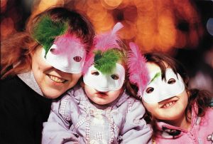 three people with masks