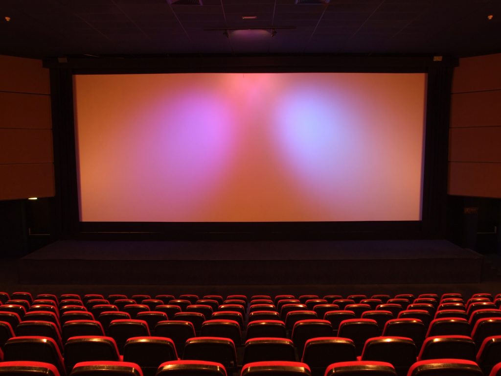 Empty seats in a movie theater.